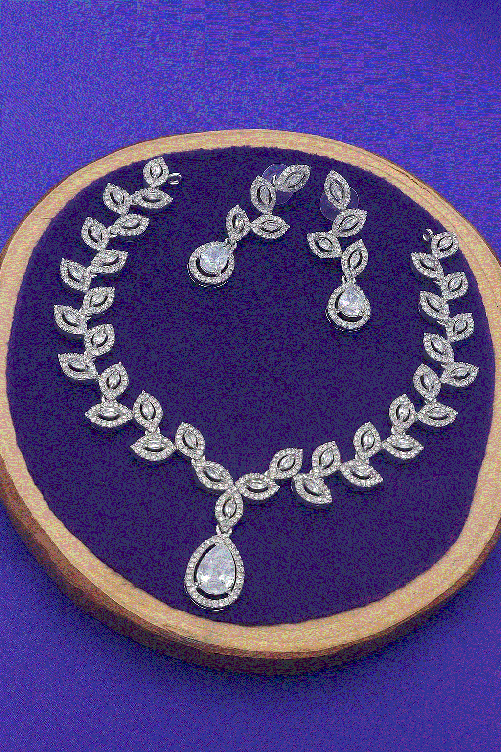 Nature-inspired CZ diamond bridal necklace and drop earrings set with silver-toned leaf design