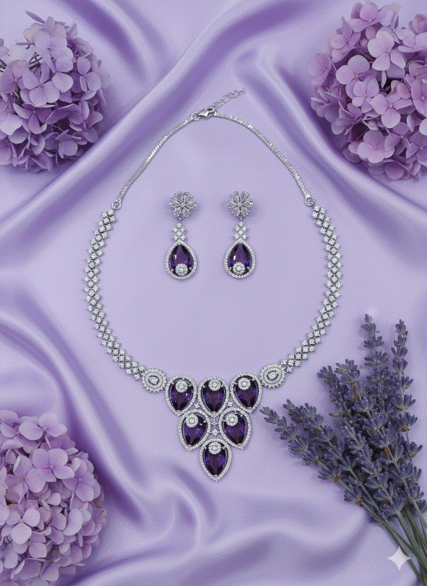 Intimate Jewelry vintage style necklace and earrings set with purple stones and clear cubic zirconia on lavender silk background
