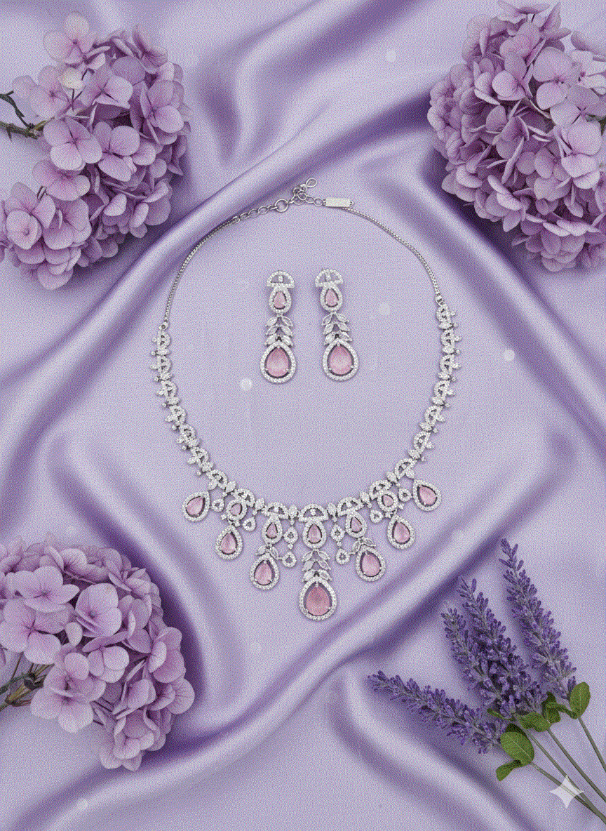 Luxury pink cubic zirconia geometric choker and drop earrings set on lavender silk with flowers, intimate jewelry style