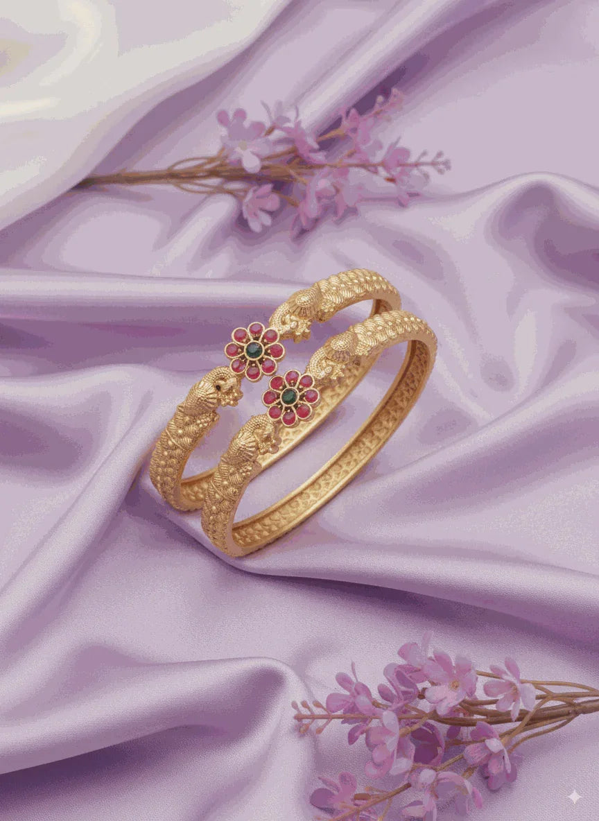 Heirloom Intimate Jewelry gold-plated enamel bangle set with traditional Kundan design on lavender fabric with pink flowers