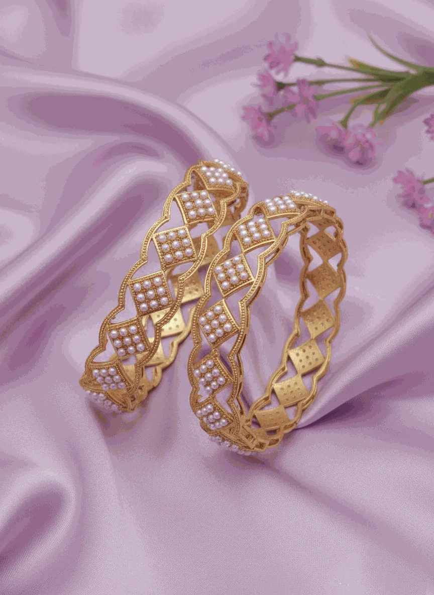 Luxury pearl intimate jewelry bangles gold plated bridal kada set with lattice design on pink satin background