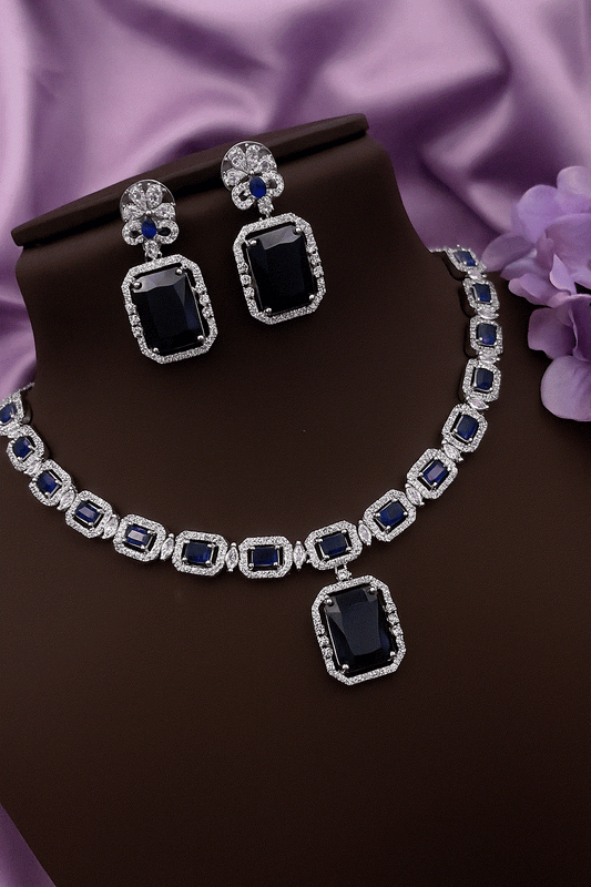 Timeless Ruby Red Pear Drop white gold tone bridal necklace and earrings set with cubic zirconia stones