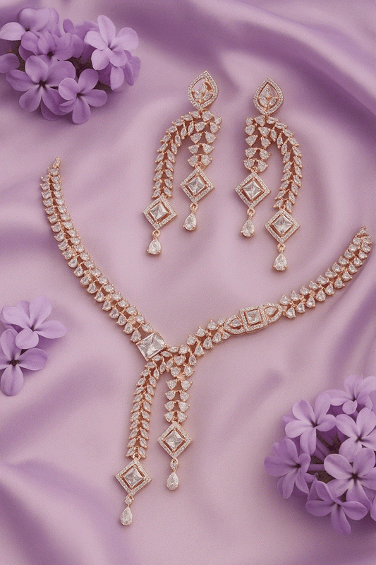 Luxury CZ Intimate Jewelry Set rose gold V-neck bridal necklace with cubic zirconia and matching diamond shape statement earrings on purple fabric background