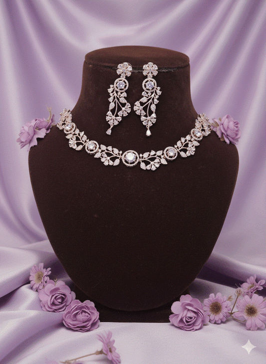 Luxury CZ Intimate Jewelry Set gold plated floral vine bridal necklace and diamond look statement earrings on velvet stand with lavender flowers