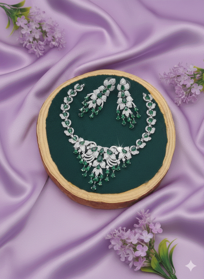 Dazzling sapphire blue drop CZ choker set with silver-toned necklace and matching dangler earrings on lavender silk background