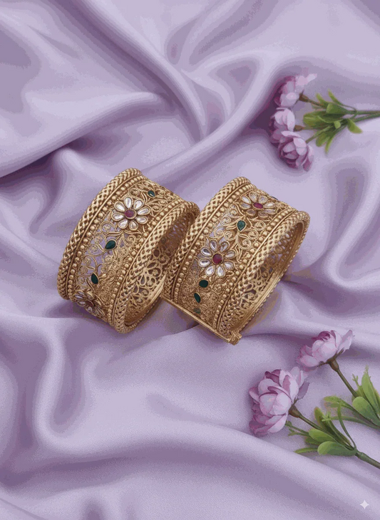 Grand Intimate Jewelry wide antique matte gold plated bridal bangles with Polki-look CZ floral design on purple silk background