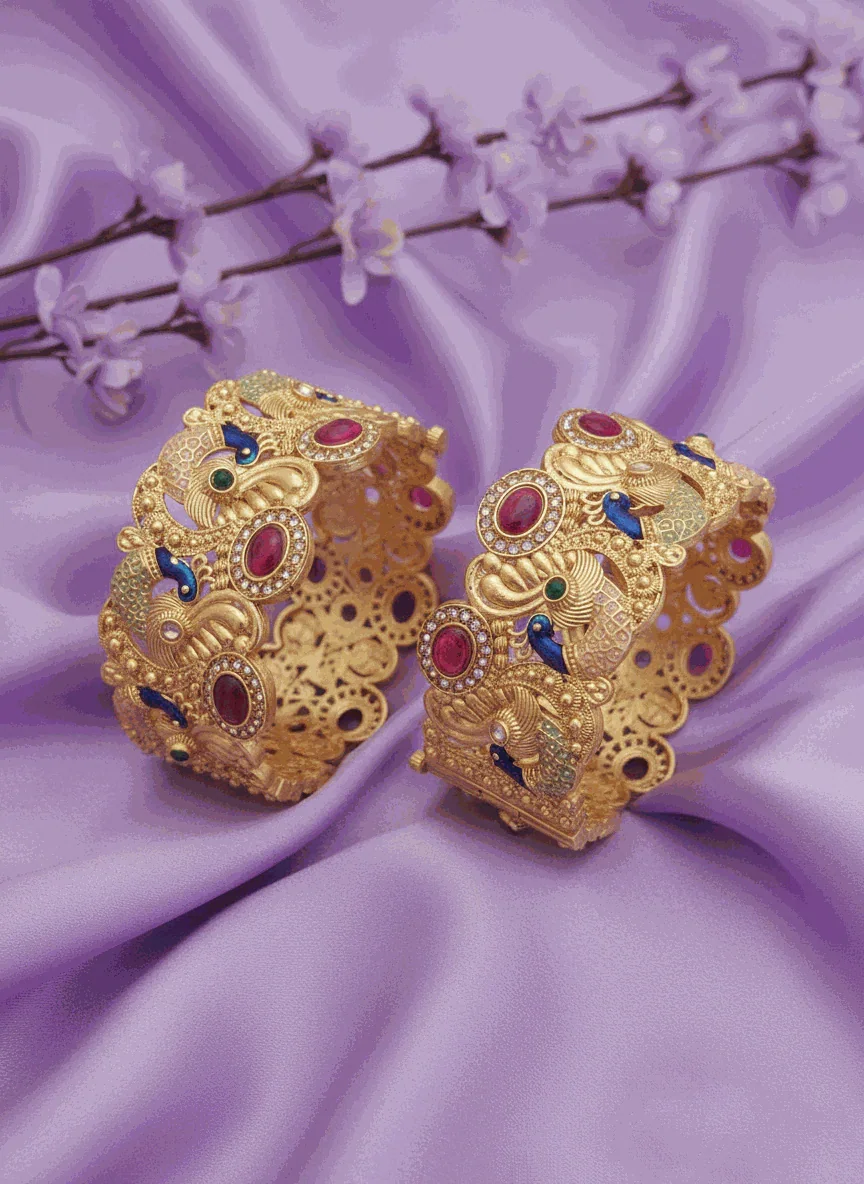 Royal Peacock Intimate Jewelry Bangles gold plated with ruby emerald CZ stones and peacock design on purple fabric background