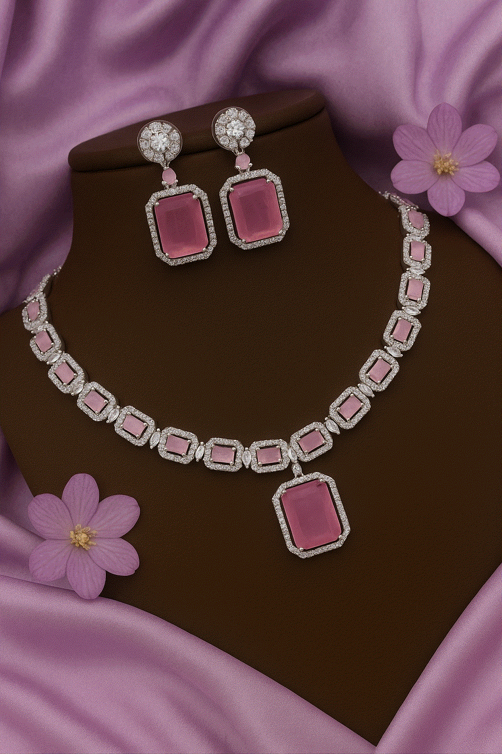 Luxury CZ Intimate Jewelry Set with pink emerald-cut gemstones and cubic zirconia accents on rhodium plating