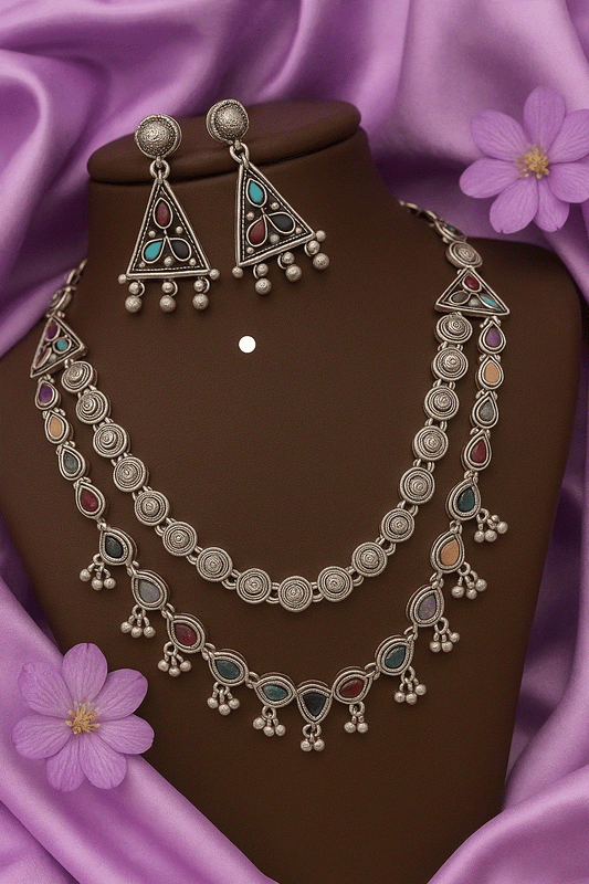 Tribal Antique Jewelry Set oxidized silver multi-color gemstone necklace with matching temple jhumka earrings on brown display
